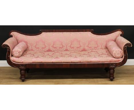 A Post-Regency mahogany scroll-form sofa, 76cm high, 203.5cm wide, the seat 174cm wide and 52cm deep, c.1830 