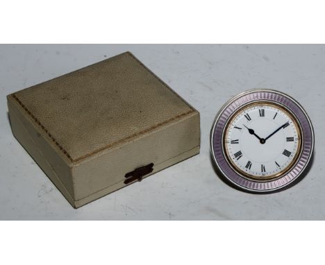 An early 20th century guilloche enamel circular easel strut timepiece, 6cm clock dial with Roman and subsidiary Arabic numera