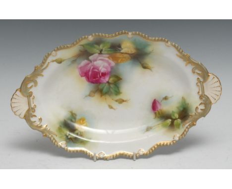 A Royal Worcester shaped oval dish, painted with pink and yellow roses on a mottled ground, indistinctly signed, twin shell h