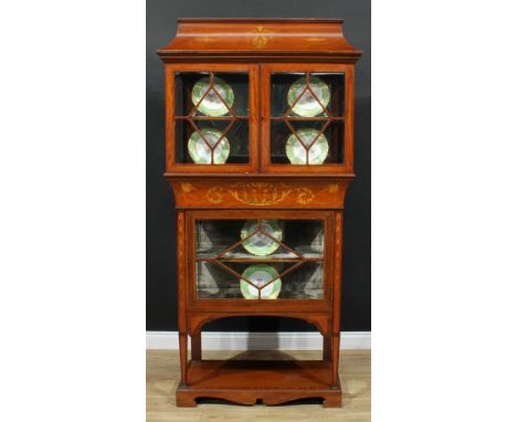 An Art Nouveau satinwood, mahogany and marquetry display cabinet, rectangular caddy top above a pair of astragal bevelled gla