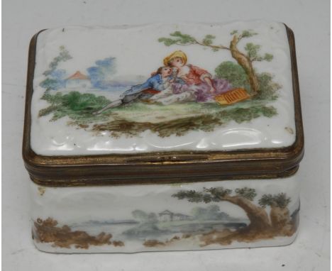 A German Rococo porcelain rounded rectangular snuff box, the hinged cover painted with lady and her beau seated in a Pictures
