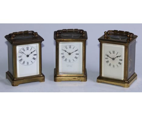 A late 19th century lacquered brass carriage clock, 5.5cm rectangular enamel dial inscribed with Roman numerals, eight-day mo