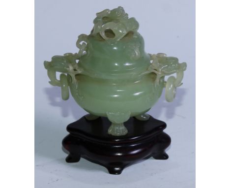 A Chinese jade tripod censer, the domed cover surmounted by a dragon, temple lion mask handles to sides, lion paw feet, 14cm 