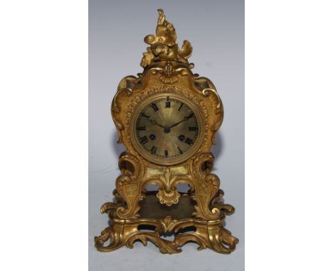 A 19th century French Louis XV style  gilt metal mantel clock, cast with scrolling foliage, gilt dial, Roman numerals, minute