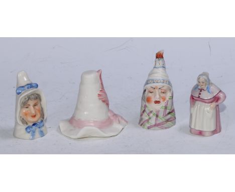 A Royal Worcester candlesnuffer, Mr Caudle, wearing a night cap and blanket, lightly coloured, 8cm high, printed crown and ci