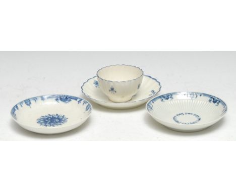 A Worcester chrysanthemum pattern tea bowl and saucer, c.1770; another saucer, Gilliflower pattern; another lambriquin border