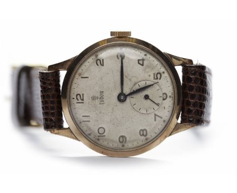 GENTLEMAN'S TUDOR ROLEX NINE CARAT GOLD MANUAL WIND WRIST WATCHsigned 15 rubies movement, the round dial with TUDOR, applied 