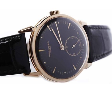 GENTLEMAN'S PATEK PHILIPPE & CO GENEVE EIGHTEEN CARAT ROSE GOLD WRIST WATCHthe round black dial with applied gold wedge and d