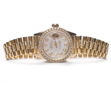 LADY'S ROLEX OYSTER PERPETUAL DATEJUST EIGHTEEN CARAT GOLD AUTOMATIC WRIST WATCH the round mother of pearl dial with diamond 