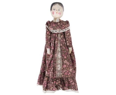 * Peg Dolls. Wooden peg doll, late 19th century, with painted hair, face and shoes, the lower limbs painted pale white, weari