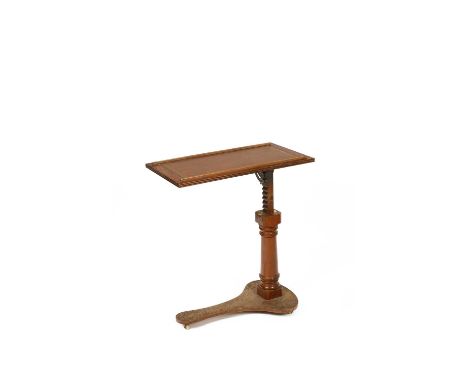 A Victorian mahogany reading table, circa 1880, the leather lined tilt top on a turned column and tripod base, 77cm wide, 41c