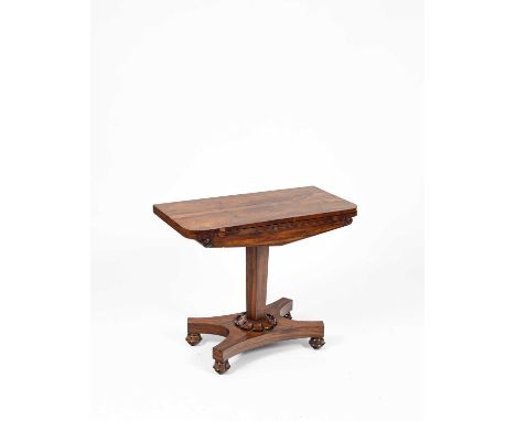 A William IV rosewood card table, the fold-over top enclosing a baize lined playing surface, on tapering column and platform 