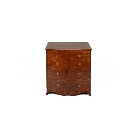 A Georgian mahogany bowfronted commode, boxwood stringing, hinged lid above cupboard doors, two long drawers on bracket feet,