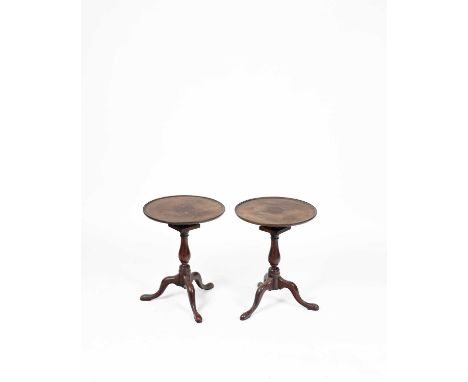 A pair of mahogany tripod tables, the tip-up tops with bird cage actions, 45cm diameter, 57.5cm high