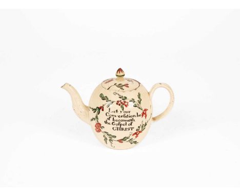 An English creamware teapot and cover, circa 1780, of globular form inscribed ‘Let your conversation be as becometh the Gospe