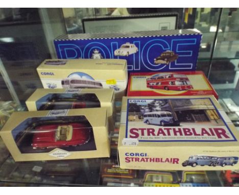 A Collection of Six Boxed Corgi Die Cast Buses, Police Cars and Others.