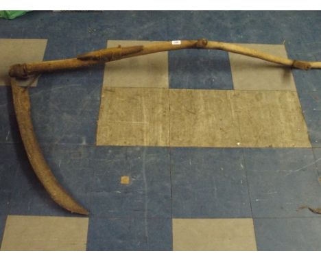 A Vintage Scythe and Wet Stone.