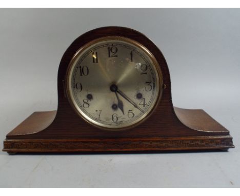 A Napoleon Hat Oak Westminster Chime Mantle Clock. 