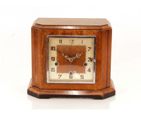 An Art Deco oak cased chiming mantel clock, 25cm high x 30cm wide 