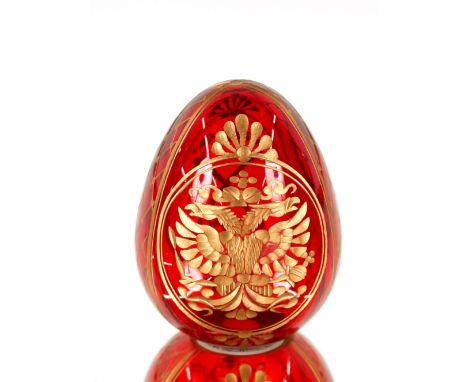 A Fabergé ruby glass egg with gilt decoration