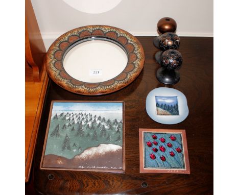 Three ceramic Arabia candle holders; an Arabia pottery plaque inset with mirror; and three other porcelain plaques