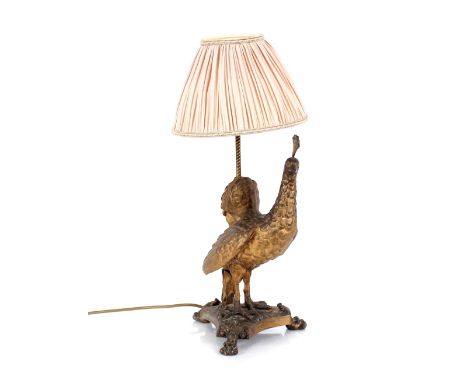 A gilded spelter peacock lamp and shade, 56cm high overall