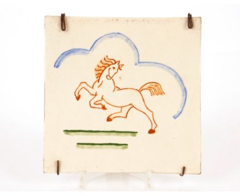 Two Art Deco tiles, one in the form of a prancing horse, the other in the form of a puppet