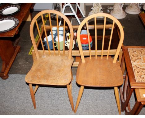 Three Ercol style stick back kitchen chairs and another similar