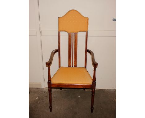 An early 20th Century mahogany Arts &amp; Crafts design elbow chair, with upholstered seat and back panel