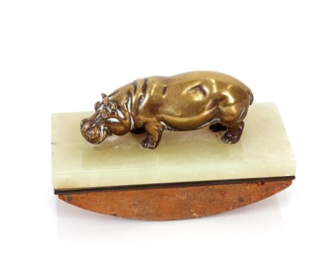 An Asprey of London Art Deco onyx rocker blotter; the bronze handle in the form of a hippopotamus