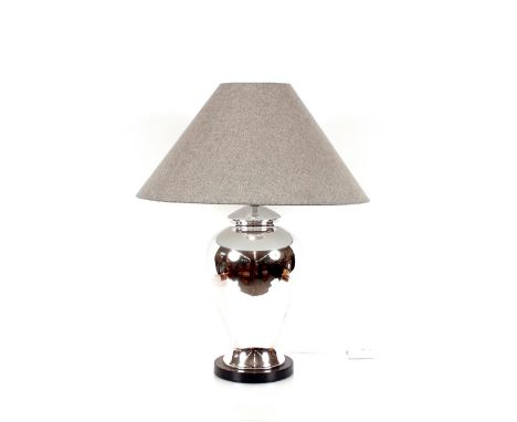 A large silvered baluster table lamp complete with shade, 76cm high