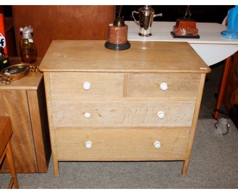 A 20th Century light oak and elm chest, of two short and two long drawers, 92cm wide 
