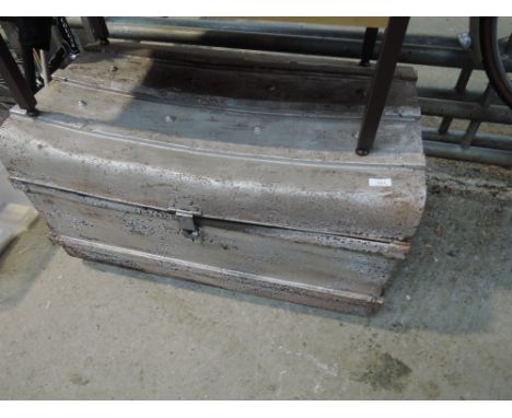 A vintage tin trunk