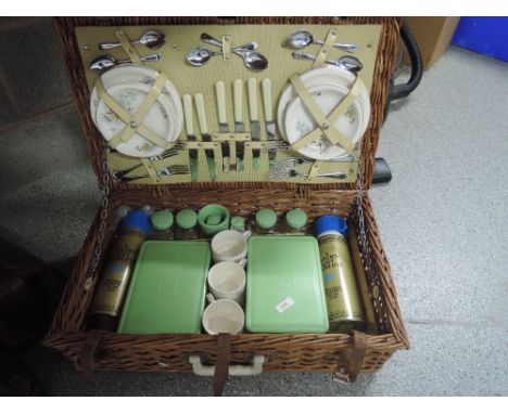 A vintage Brexton picnic hamper including thermos flasks etc