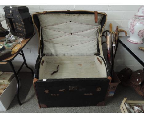 A vintage lined travel trunk