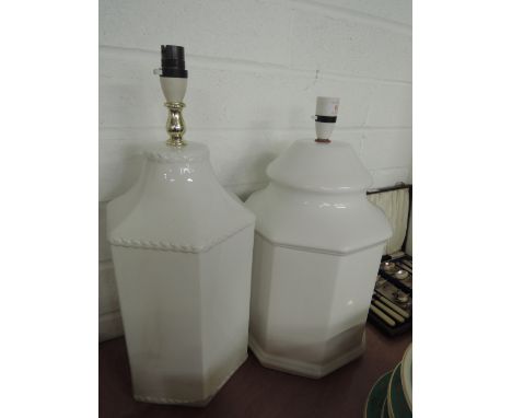 Two white ceramic decorative table lamps