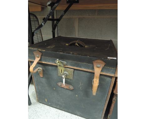 A vintage square travel trunk 