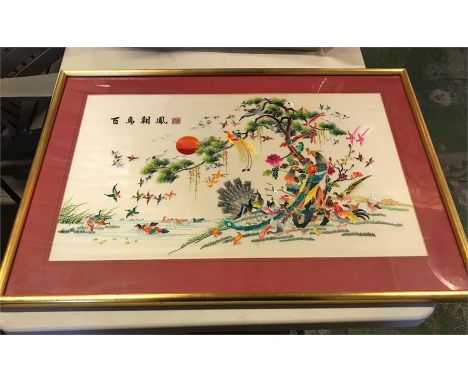 A framed Chinese silk print
