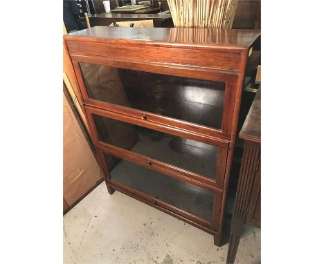 A three tier Globe Wernicke style bookcase