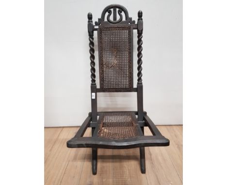 CARVED OAK FOLDING CHAIR WITH  BERGERE AND BARLEY TWIST BACK