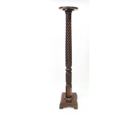A Victorian mahogany carved and ropetwist four poster bed column, adapted as a torchere, 146cm high.