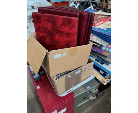A large box of first day covers and a box containing 5 empty cover files 