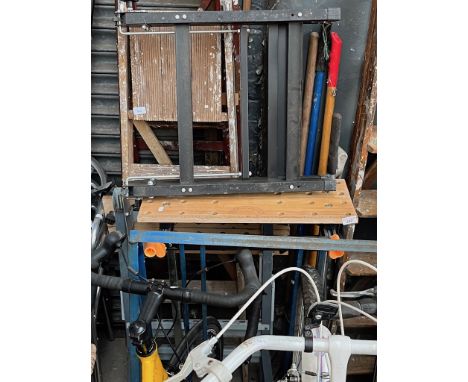 5 sets of wooden ladders, 2 workbenches, a bundle of garden tools, a metal garden umbrella stand, car roof bars and a steam m