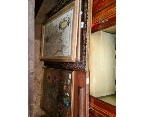 A mirror, a needlework picture, a map and a firescreen. 