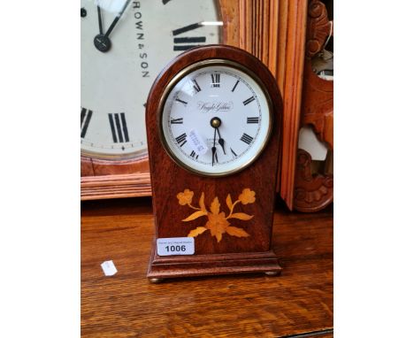 A Knight Gibboons inlaid mahogany domed clock. 