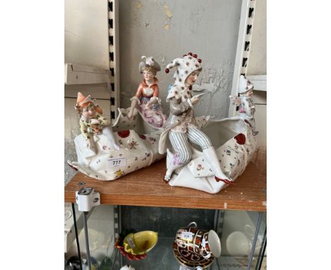 A pair of continental porcelain planters. Condition:- General wear to both through age and use. Planter with lady in dress - 