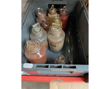 A box of glass including poison bottles, rolling pin etc.