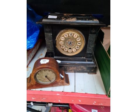 An ebonised wooden case mantel clock and a small domed mantel clock - AF. 