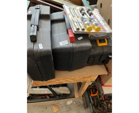 A cased mains power hammer drill, a cased mains power wood planer, an unused set of screwdrivers, an unused 40 piece 3/8" and