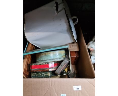 A box containing, shoe lasts, old tins, wooden boxes and an enamel bread bin 